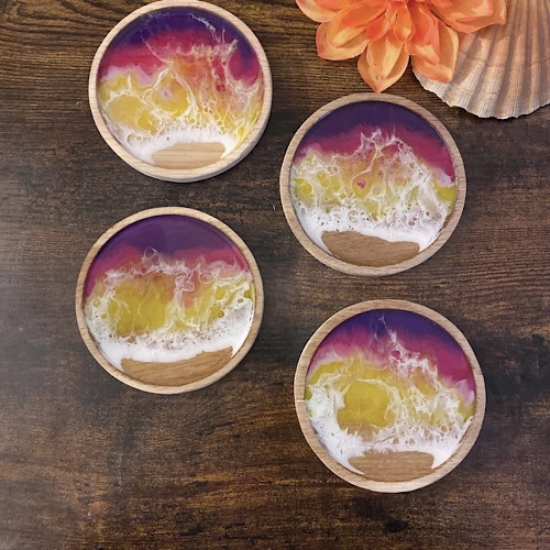 set of four tropical pinks and yellow drinks coasters