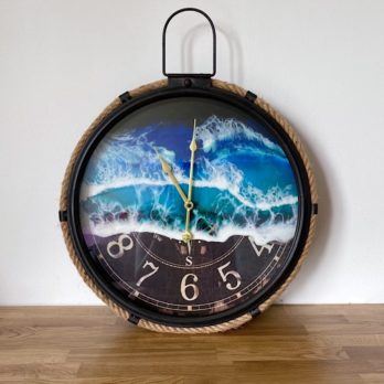 Oversized metal and rope ocean wall clock