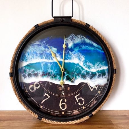 Metal and rope nautical wall clock