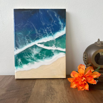 Turquoise and blue crossing wave beach wall art